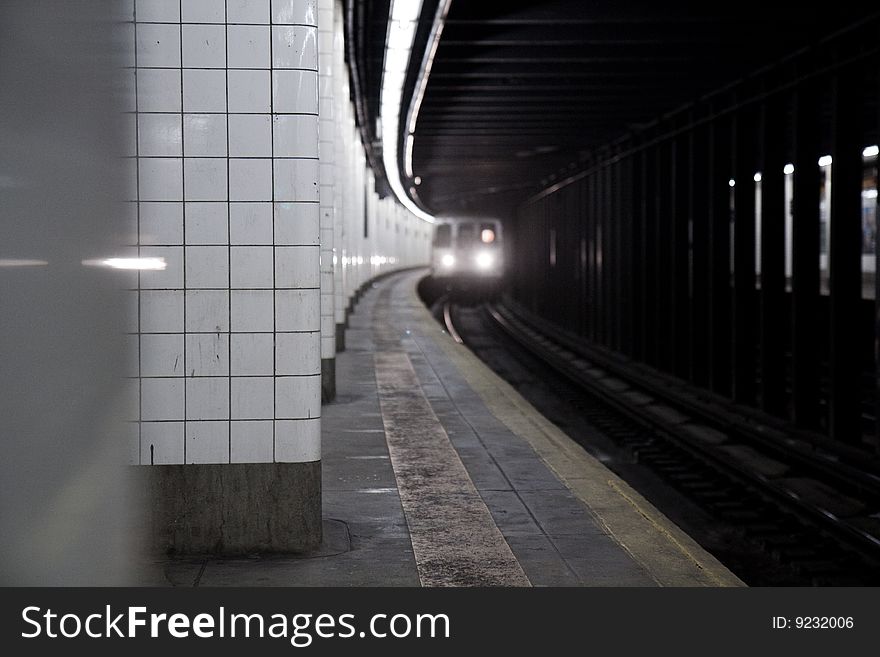 Subway train arriving to the Brooklyn subway station. Subway train arriving to the Brooklyn subway station