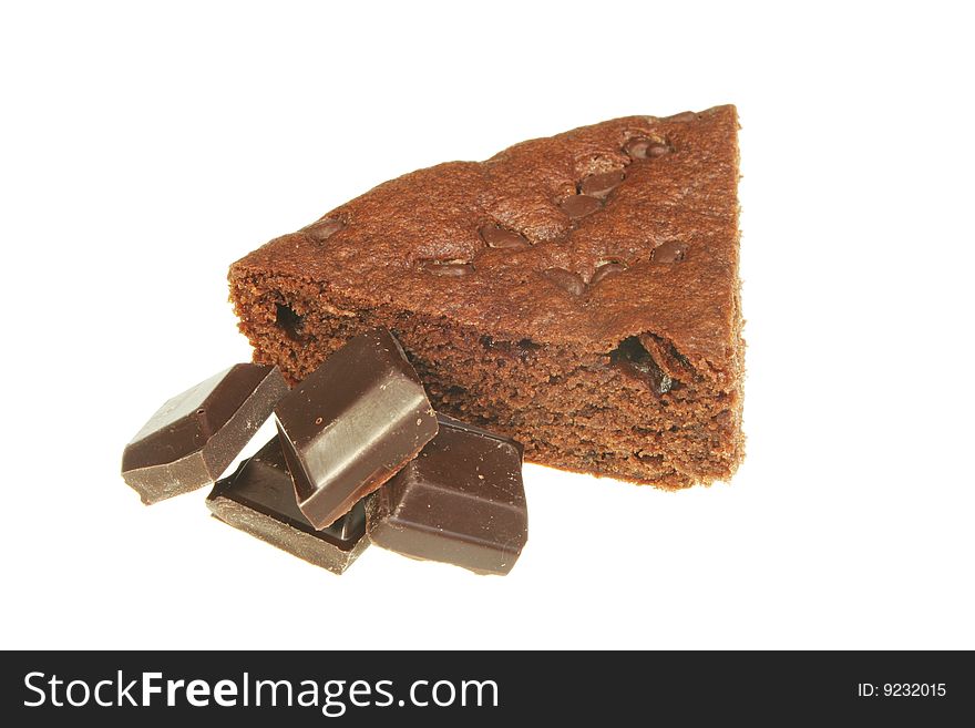 Slice of chocolate fudge brownie cake with chunks of chocolate isolated on white. Slice of chocolate fudge brownie cake with chunks of chocolate isolated on white