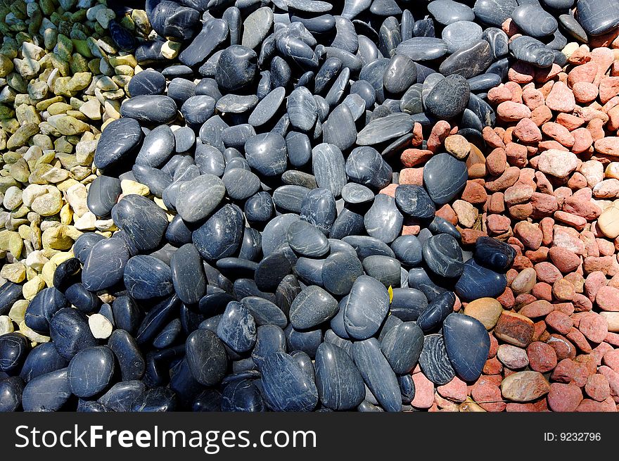 Pebbles of different color, size and texture. Pebbles of different color, size and texture