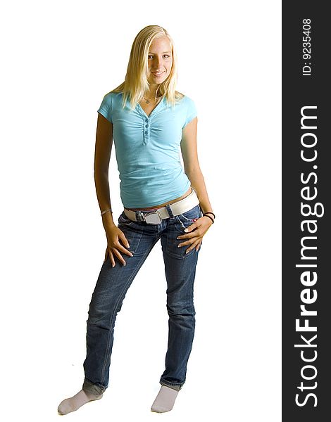 Young beautiful blond teenage girl posing isolated on white