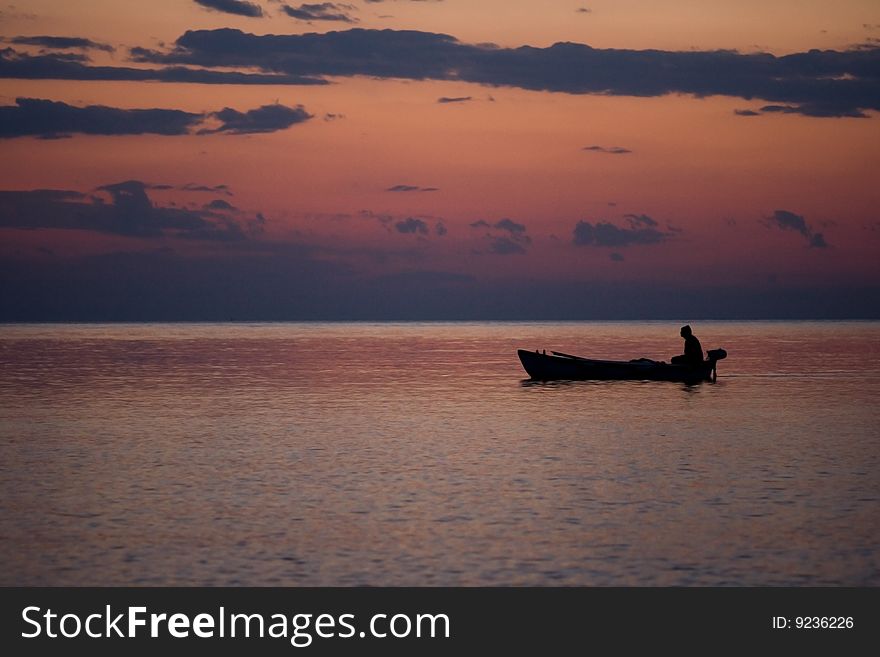 Fishing Boat In A Sunset Light