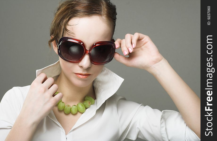 Portrait of young woman with sun-glasses. Portrait of young woman with sun-glasses