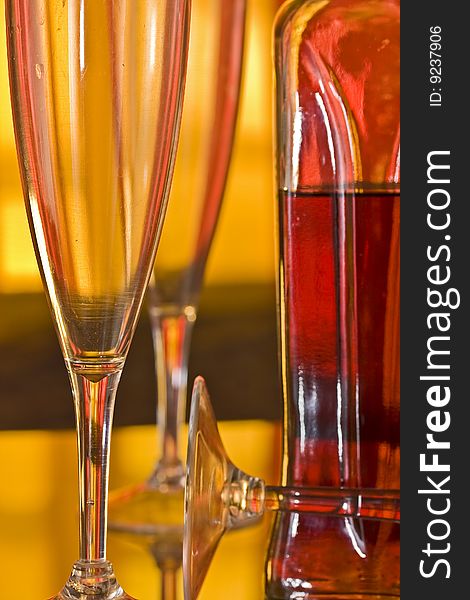 Champagne glass with yellow and orange background. Champagne glass with yellow and orange background