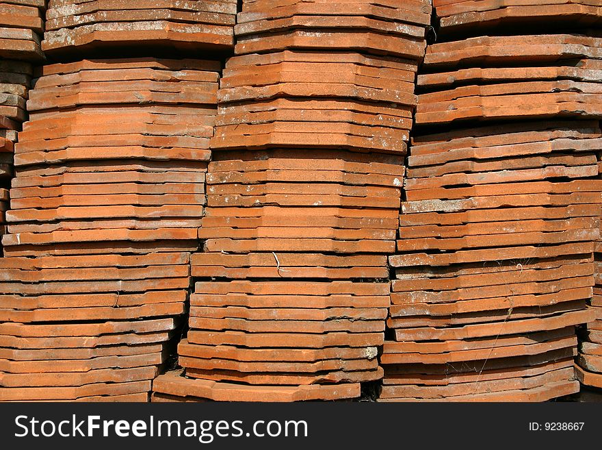 Stock photo of old red tiles put one on another. Stock photo of old red tiles put one on another