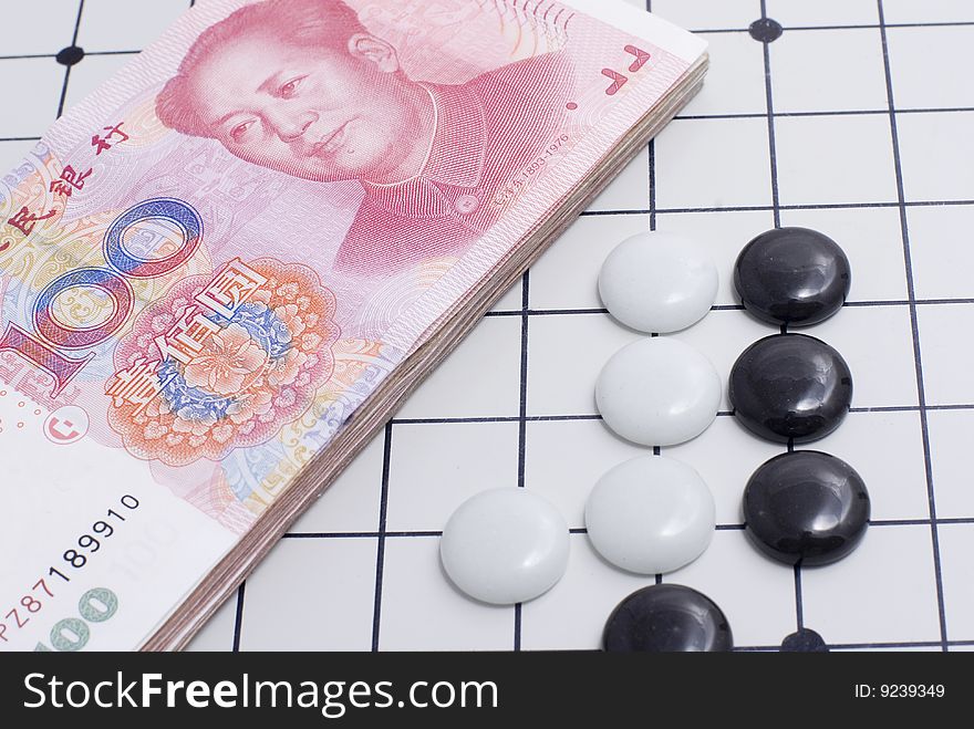 The china currency and I-go on chessboard