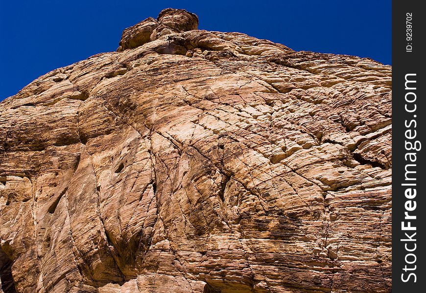 View of red rocks from a low angle. View of red rocks from a low angle.