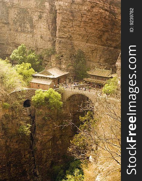 Cangyanshan, Hebei Province, China. the temples and the bridge over the deep canyon in the middle of the mountains. Cangyanshan, Hebei Province, China. the temples and the bridge over the deep canyon in the middle of the mountains