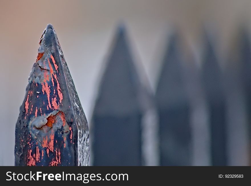 Peeling spiky fence posts. Yeeoowch!. Peeling spiky fence posts. Yeeoowch!