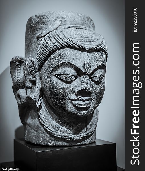 The Norton Simon Museum in Pasadena, California Shivalingam with One Face, India, Bihar, c. 750-800, Chlorite From the curation card: This strongly modeled and sharply curved head of Shiva is distinguished by a vertical third eye, representing the god&#x27;s transcendental wisdom. The crescent moon in his matted hair symbolizes the power of regeneration; behind his right ear is a rearing cobra, which represents the infinite cycles of time. www.minerals.net/mineral/chlorite.aspx