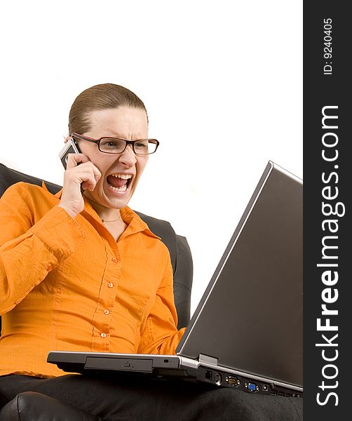 Young woman screaming at laptop isolated