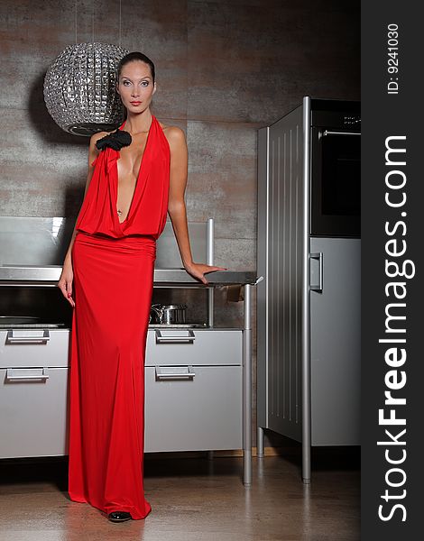 Woman in red in luxury interrior