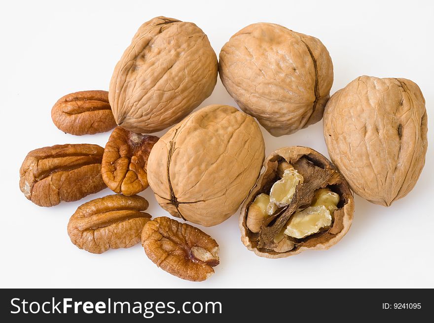 Vegetarian diet background with 
ripe  full nuts  and nutshell