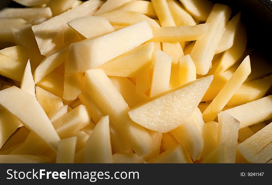 Peeled and chopped potatoes. close-up