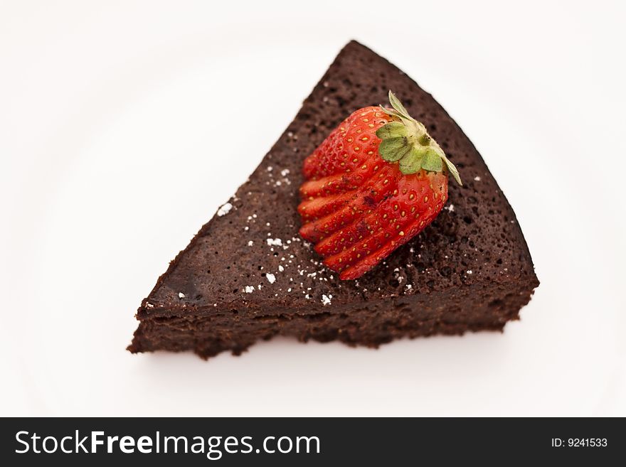 Chocolate mud cake topped with strawberries