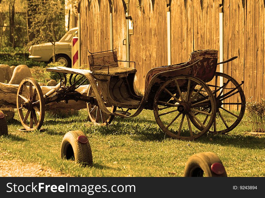 Old Carriage in sepia on the Nature