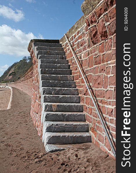 Stone steps in sea defence wall. Stone steps in sea defence wall