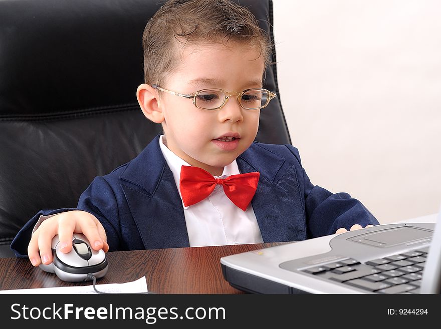 white small businessman looking for his market crises and studying at notebook. white small businessman looking for his market crises and studying at notebook