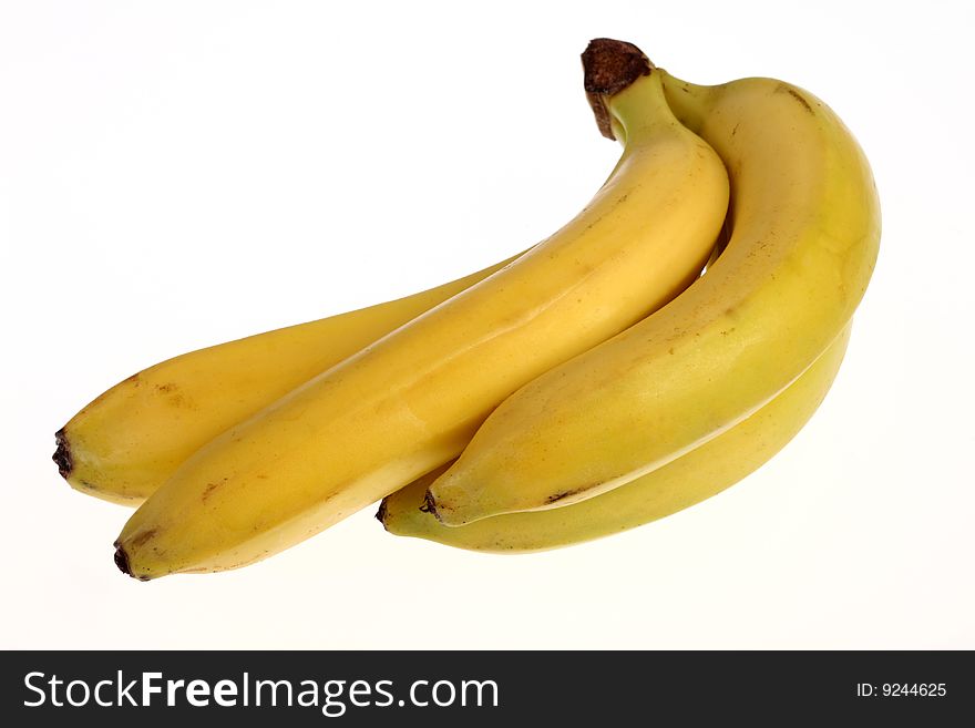 Four bananas on white background