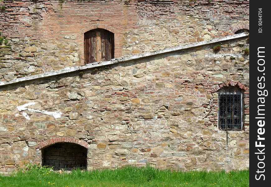 Ancient medieval brick wall with climbing stairs. Ancient medieval brick wall with climbing stairs