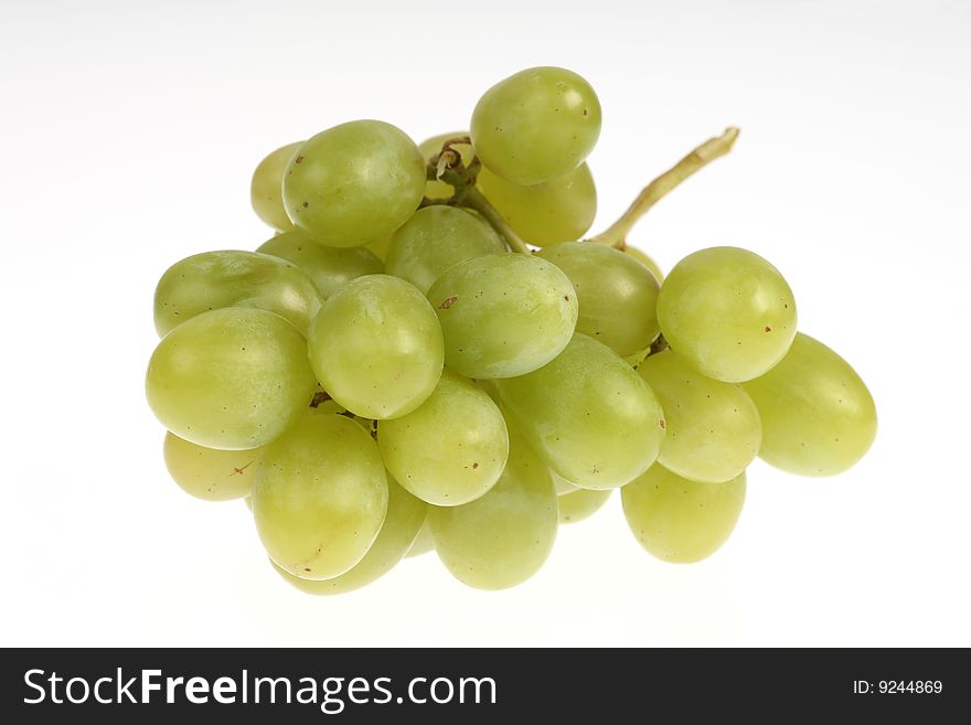 Still life of white grapes on white background