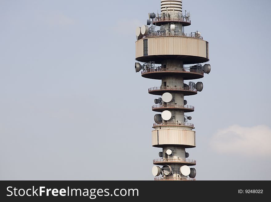 View of part of a tower full of communication antennas