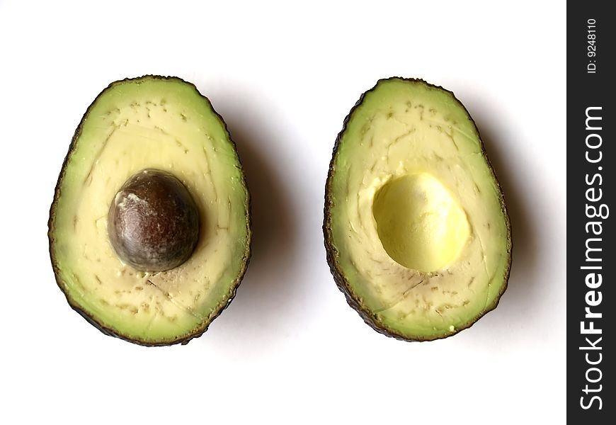 An open avocado fruit, white background