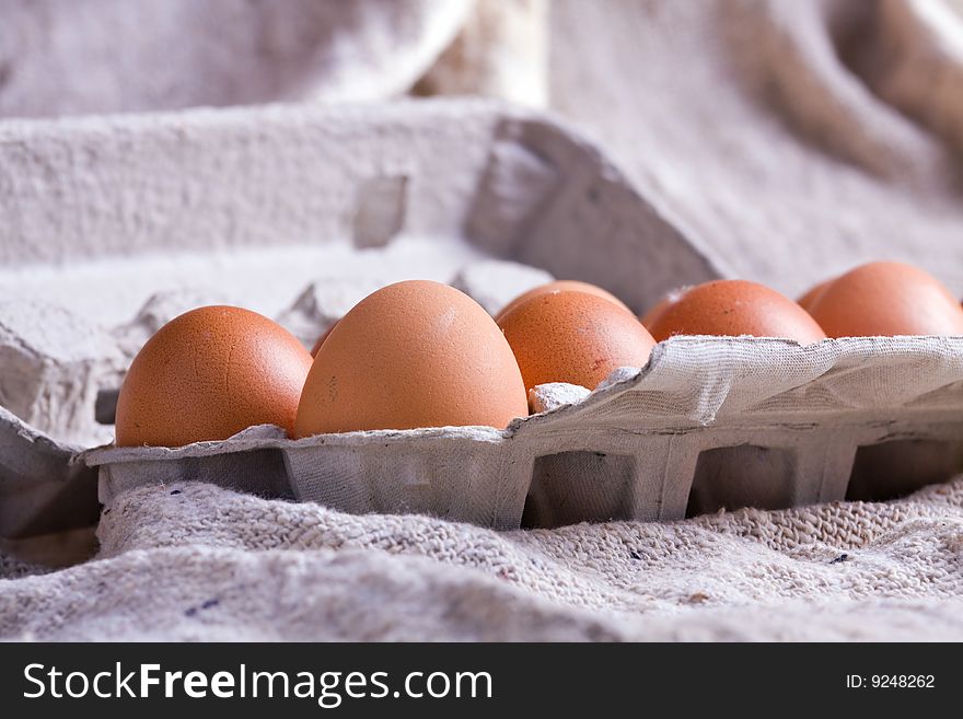 An open carton egg box with eggs. An open carton egg box with eggs