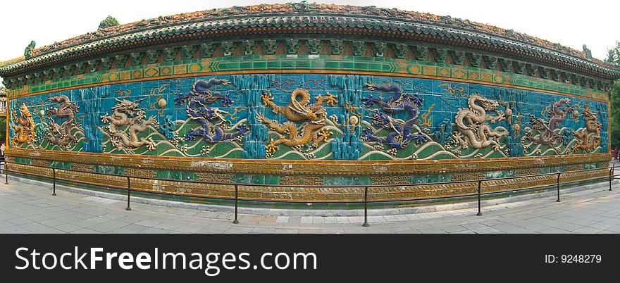 The Nne Dragons Wall in Bei Hai Park in Beijing, China. The Nne Dragons Wall in Bei Hai Park in Beijing, China