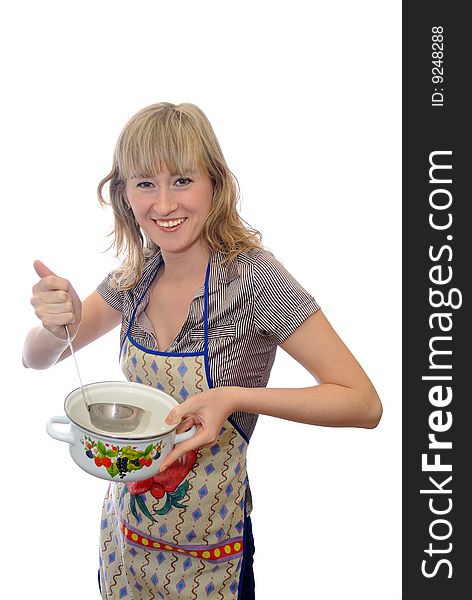 The cheerful girl with a ladle and a pan. Isolation on  white. The cheerful girl with a ladle and a pan. Isolation on  white