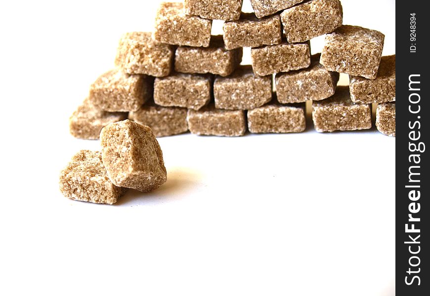Brown sugar cubes on a pile