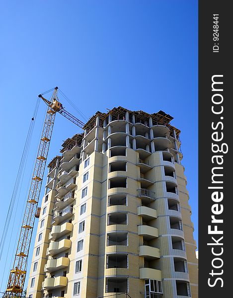 Building of the modern high-rise house. Building of the modern high-rise house