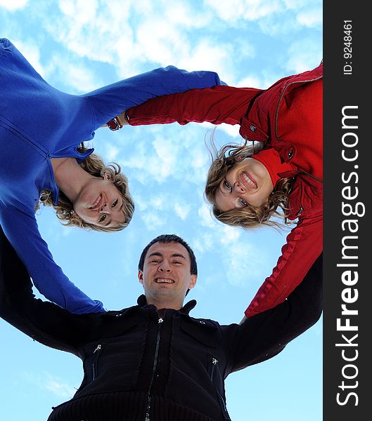 Three teenagers on the sky
