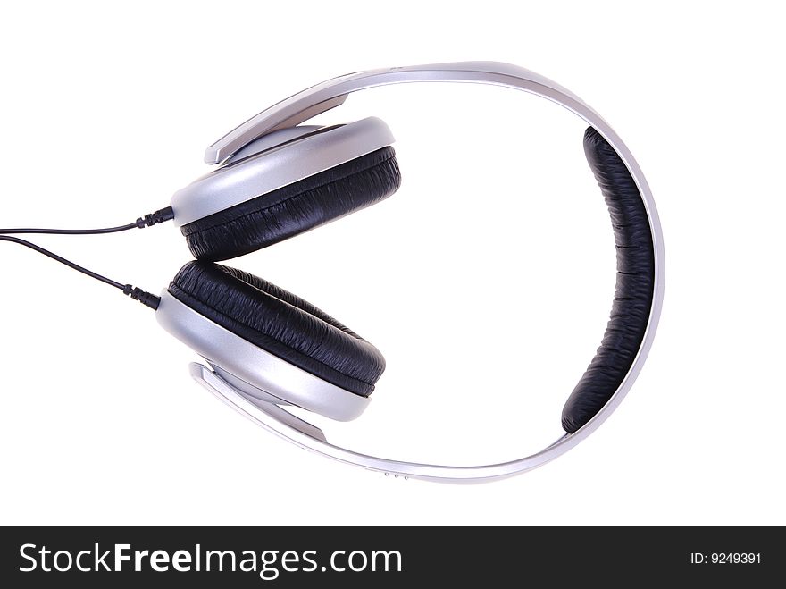 Modern silver electrical headphones isolated on white background
