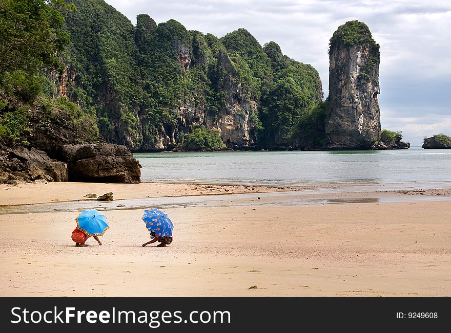 Two umbrellas at Ao Nang Beach, Thailand