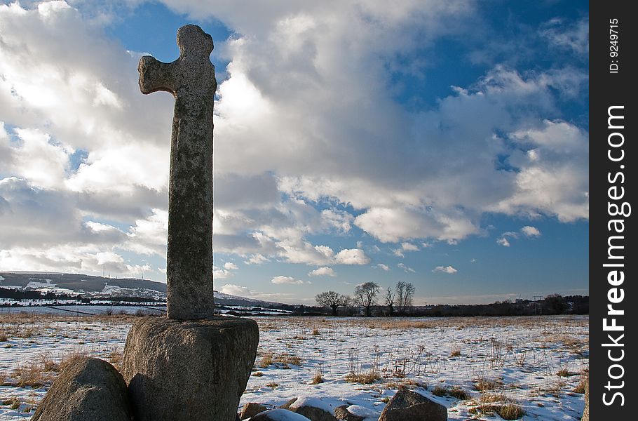 Stone Cross In Snow