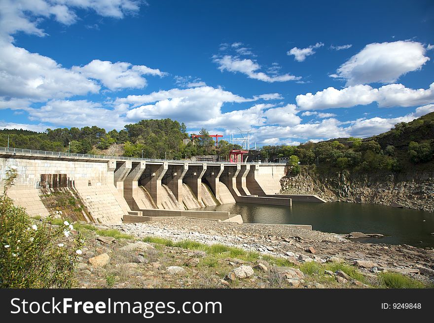 Dam at river tajo in caceres extremadura spain. Dam at river tajo in caceres extremadura spain