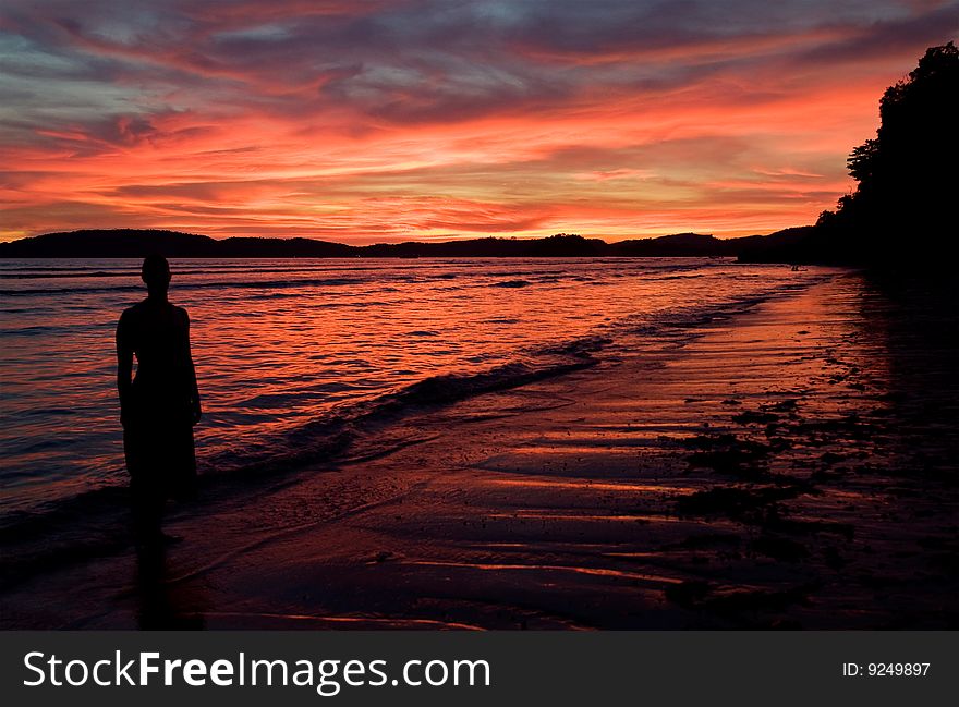 Deep red sunset at the beach