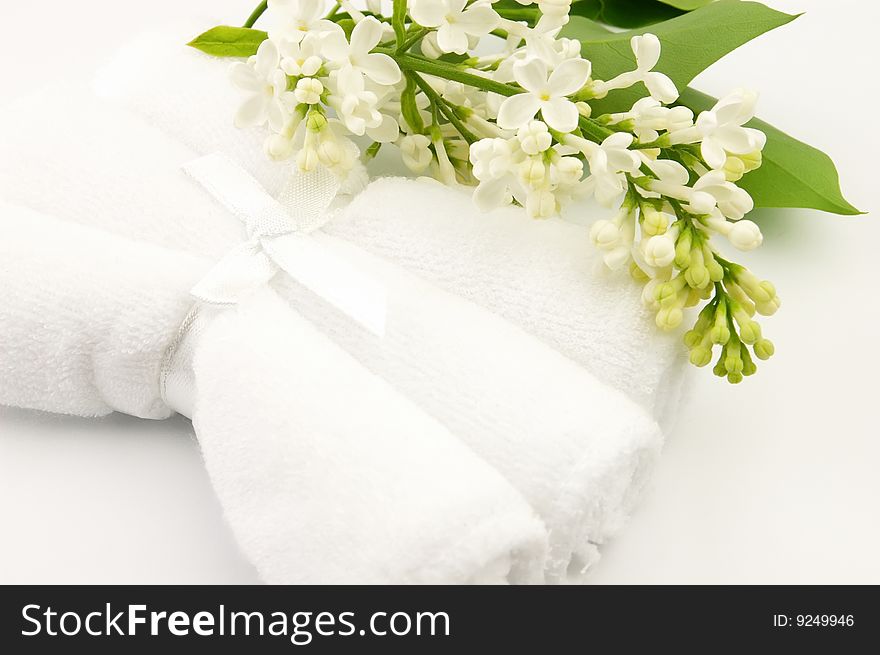 White towels with white lilac