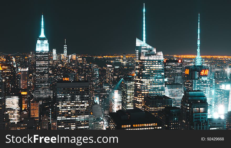 A panorama of the island of Manhattan at night in New York City. A panorama of the island of Manhattan at night in New York City.