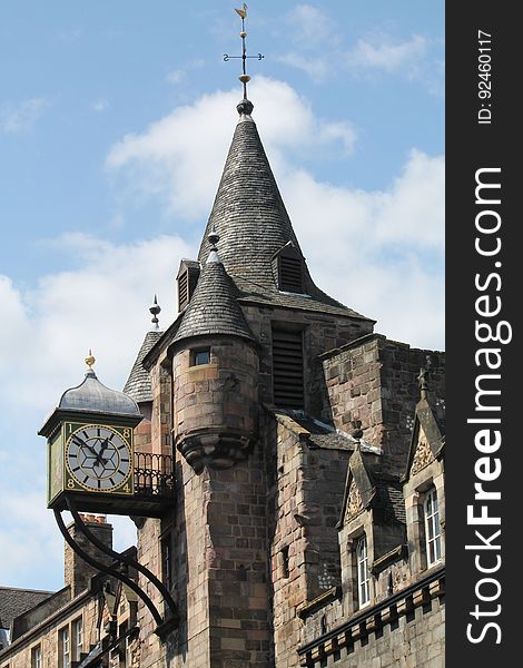 The clock and the tower on the Canongate Tolbooth on the lower section of the Royal Mile in Edinburgh, Scotland. The clock and the tower on the Canongate Tolbooth on the lower section of the Royal Mile in Edinburgh, Scotland.