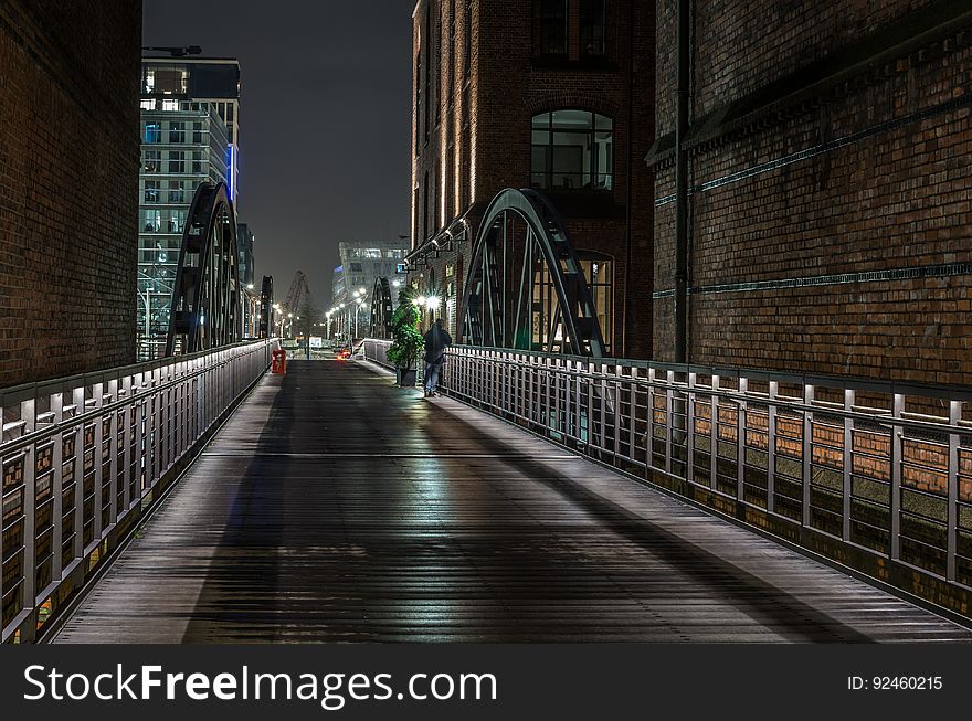 A bridge in a city at night. A bridge in a city at night.