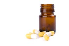 Bottle With Yelllow Capsules Royalty Free Stock Image Bottle With Yelllow Capsules Royalty Free Stock Image