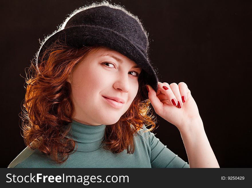 Young Girl In Black Hat