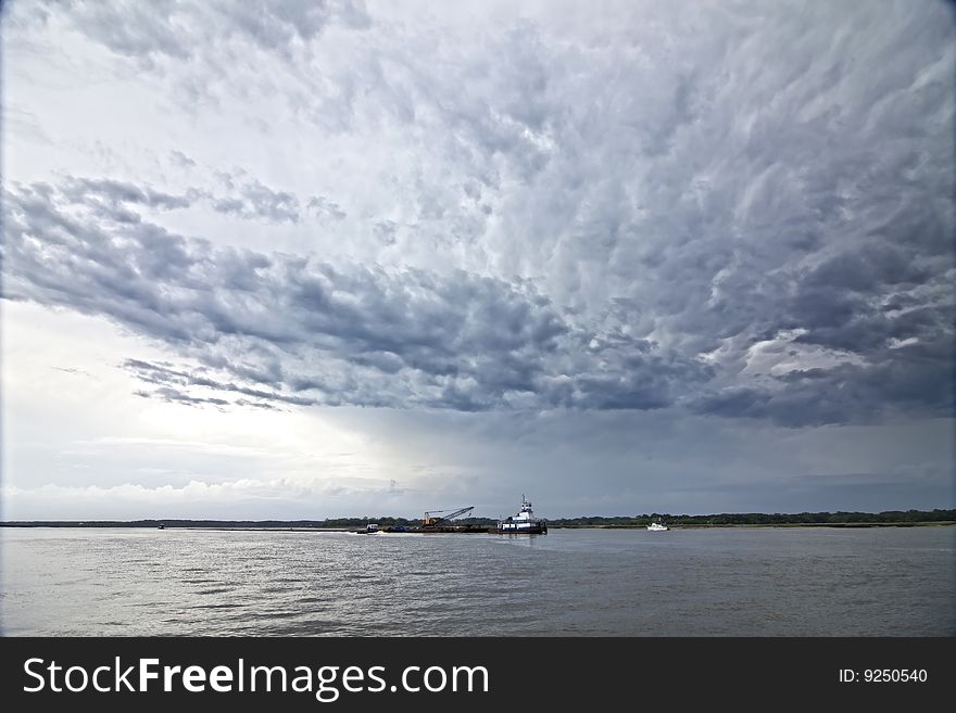 Tug Boat And Angry Weather