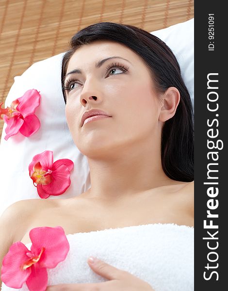Attractive young woman relaxing in spa, beauty, wellness salon. Attractive young woman relaxing in spa, beauty, wellness salon