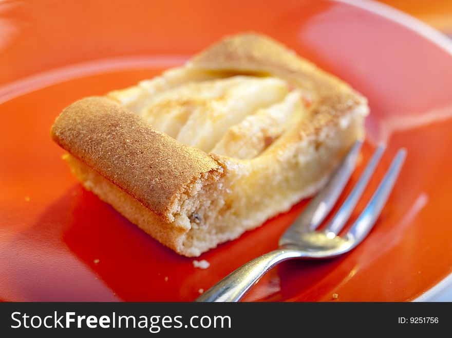 Piece of apple pie on a plate