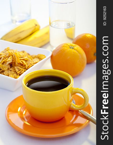 Coffee with cornflakes and fruits. Coffee with cornflakes and fruits