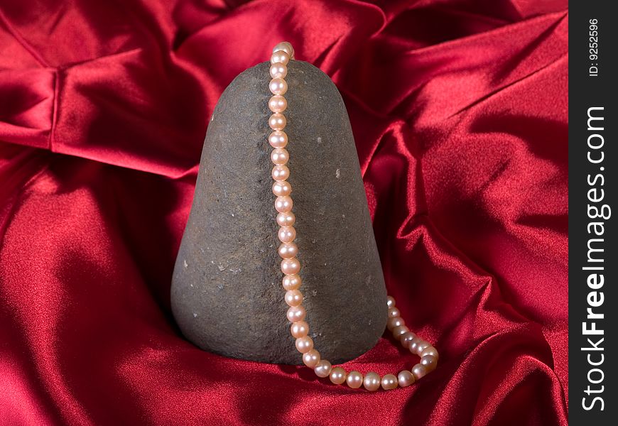 Necklace from pearl on stone