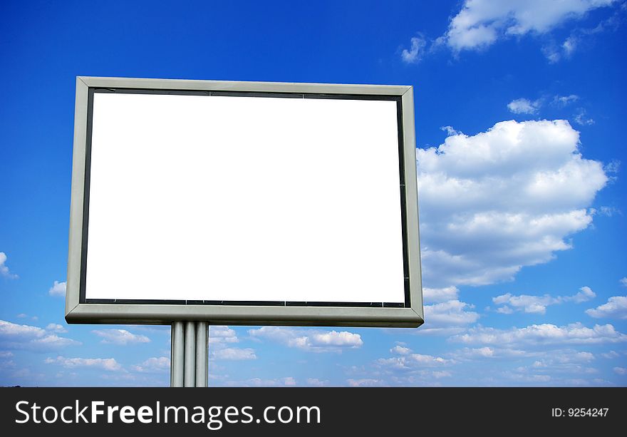 Advertising billboard on sky background
