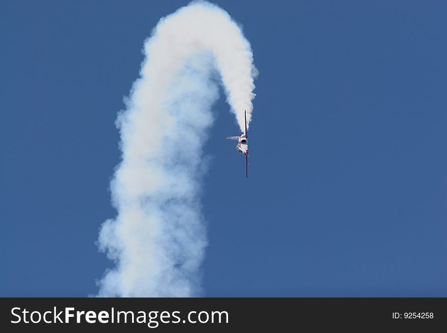 Aerobatic aircraft making looping in the air